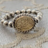 Oval Ring with Arabic Calligraphy, Balls band